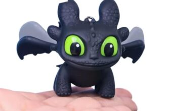Dragon Keychain Toy with LED Eyes and Moving Wings, Small Plastic Figure with On Off Switch for Dashboard or Keyring